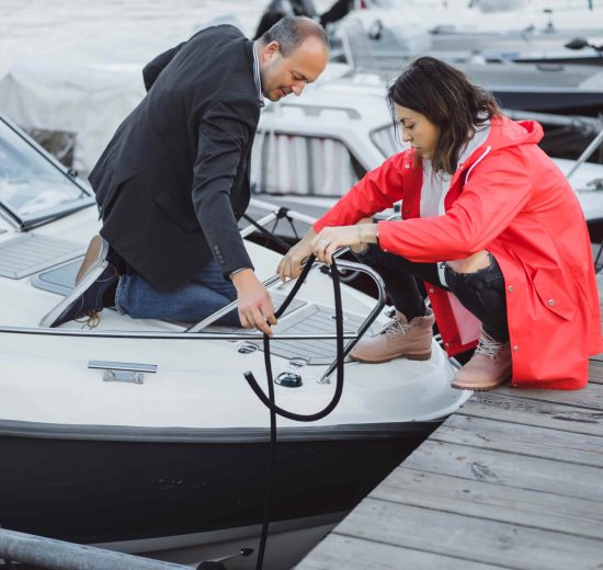 young-couple-yachting-port-min